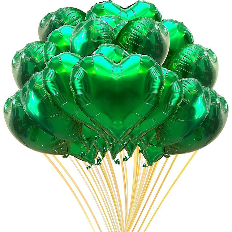 Gröna hjärtformade ballonger